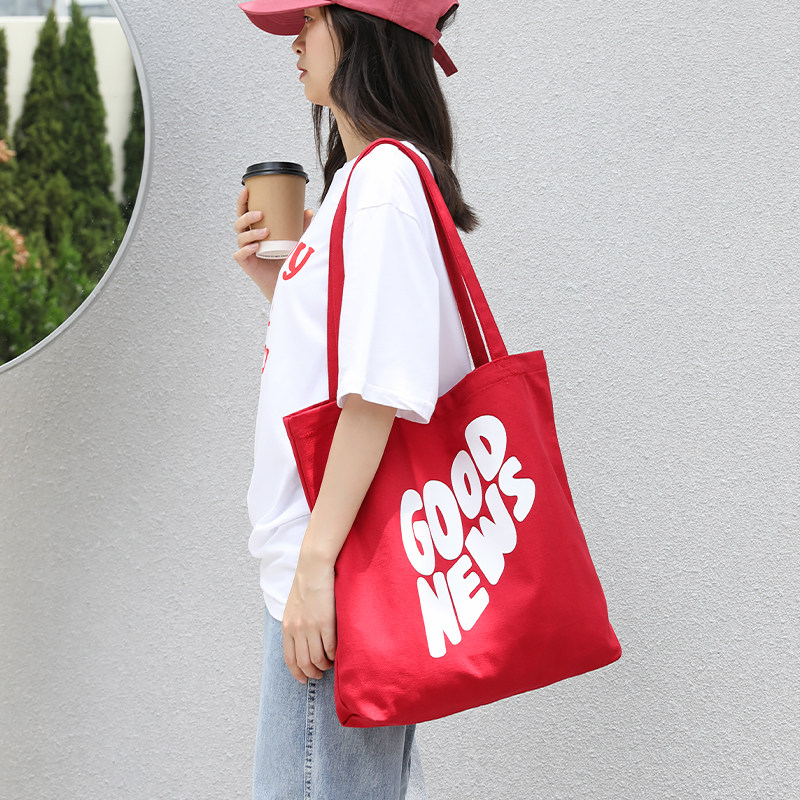 热情欧尼~红色帆布包女大容量托特包韩版ins风文艺百搭字母单肩包