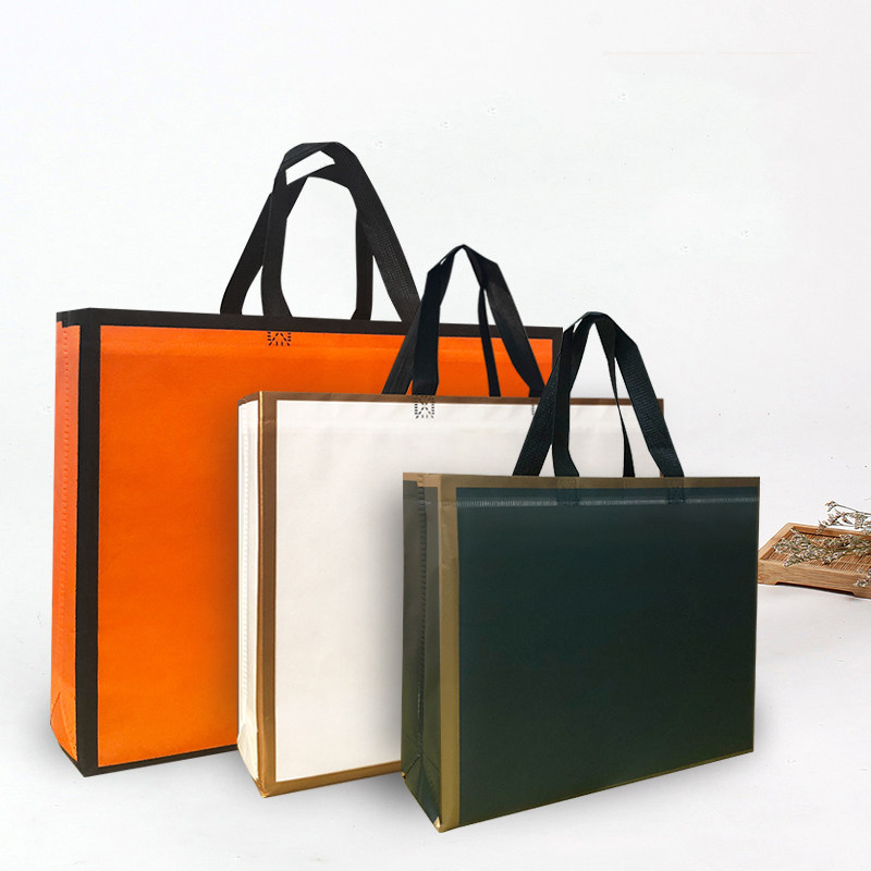 网红款纯色金边轻奢极简时尚简约服装袋覆膜无纺布手提袋礼品袋子