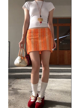 美式低腰辣妹橙色竖条纹半身裙女带安全裤百搭显瘦格纹印花超短裙
