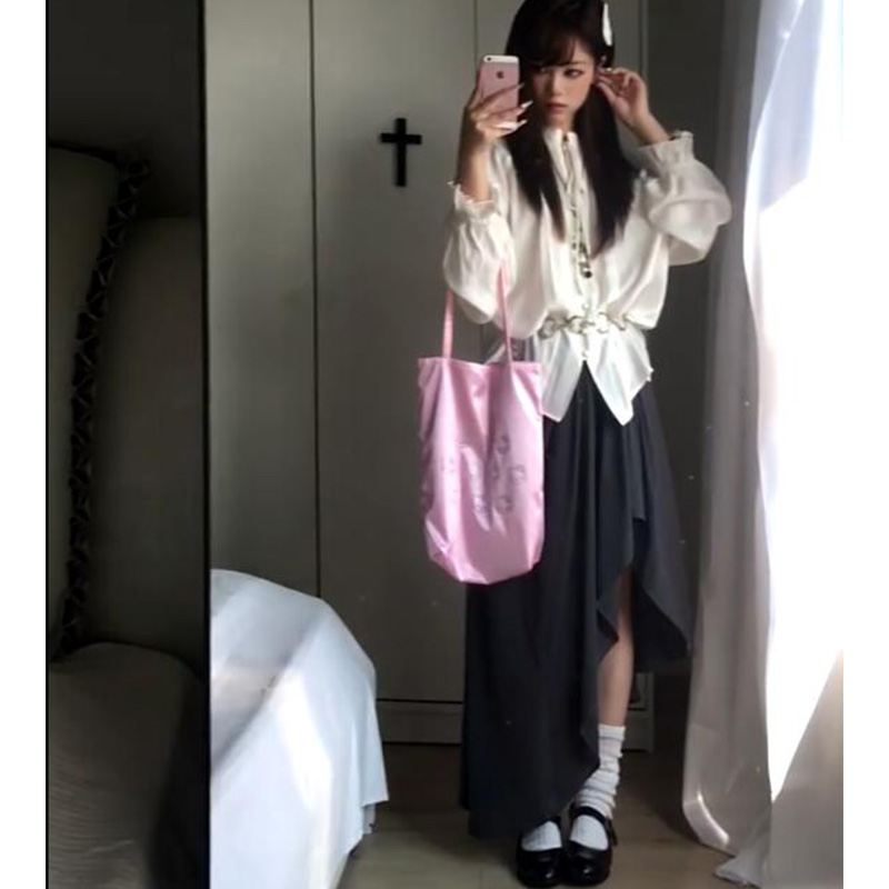 设计感不规则裙摆针织半身裙女2025新款小众高腰休闲缩褶中长裙