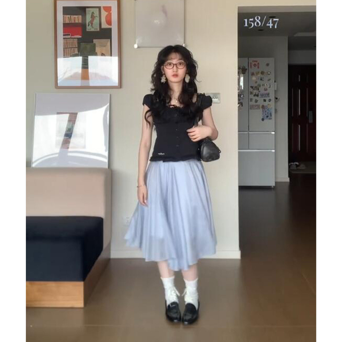 法式蓝色不规则下摆半身裙女2026新款低腰宽松休闲百搭A型伞裙