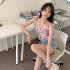 Real newspaper print suspender vest