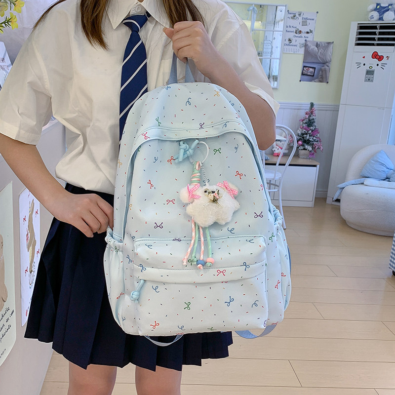 小学生男女时尚印花双肩背包