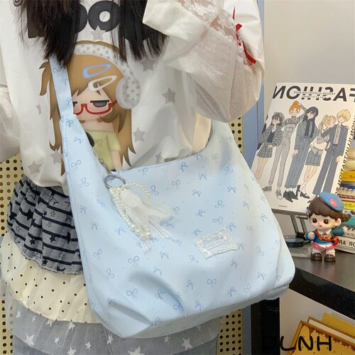 少女蝴蝶结防水饺子斜挎包