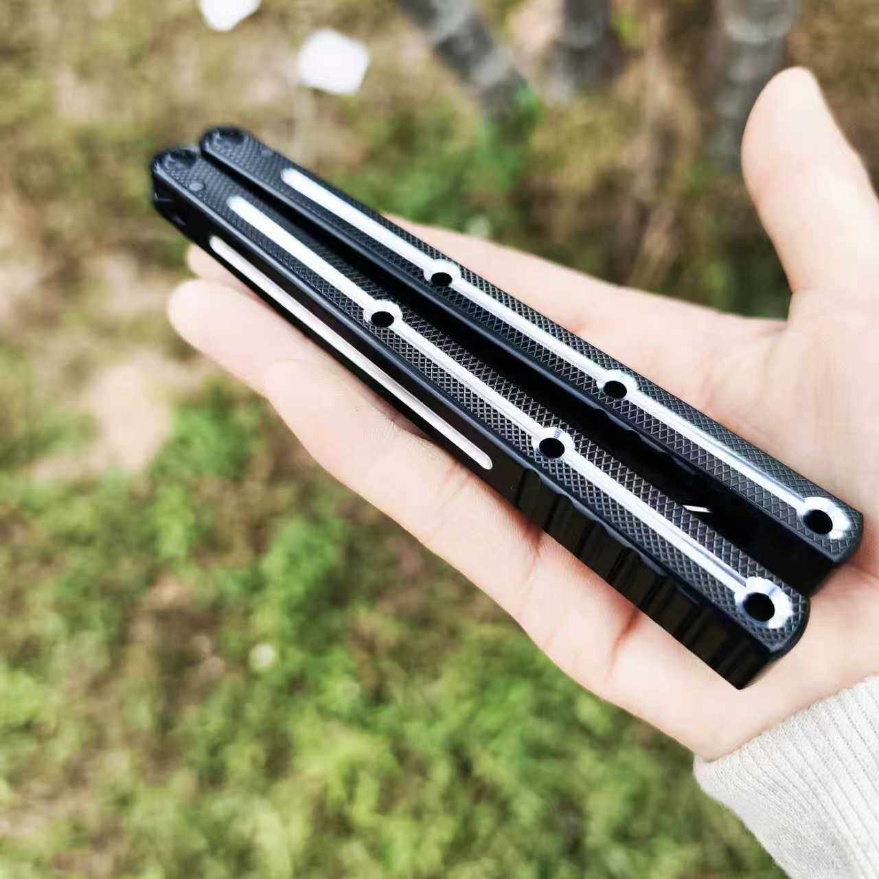 无疆海妖亮槽 标准版 假刃版 方头博弈蝴蝶刀冠绝天 轴套未开刃 - 实物图