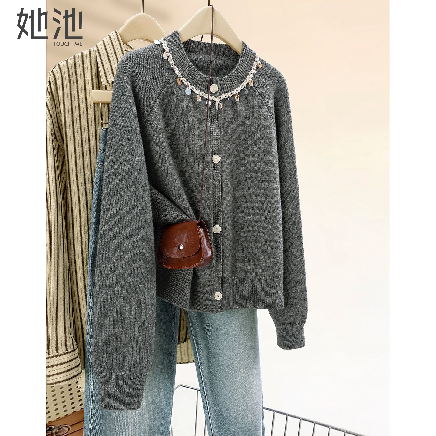 她池插肩长袖圆领宽松款针织衫