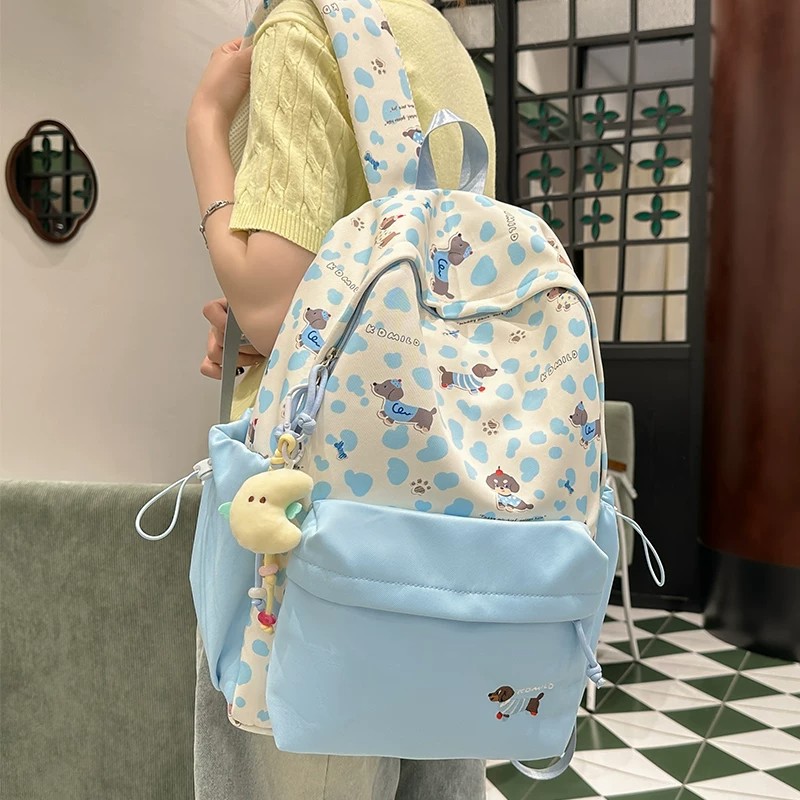 小众设计感卡通豹纹书包女大学生初中可爱双肩包旅行出游小背包轻