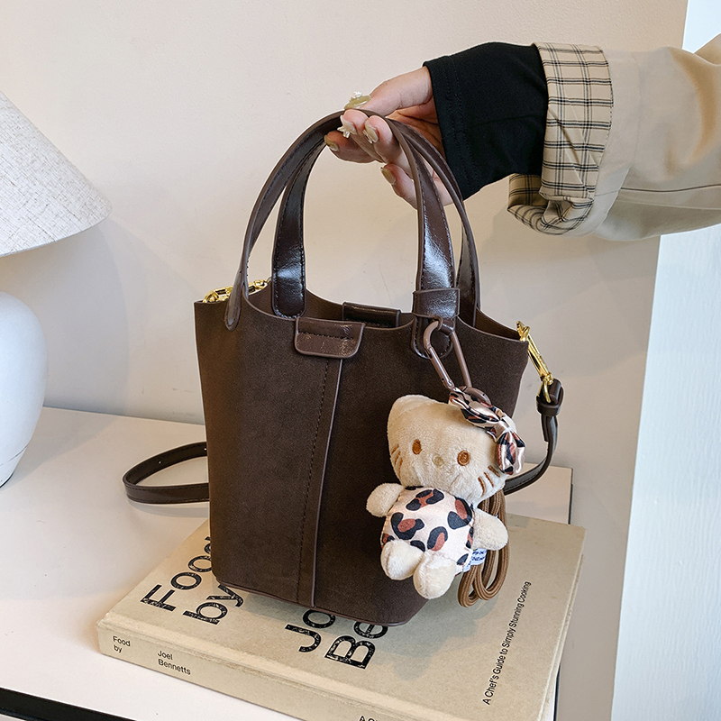 LAOYJA复古荔枝纹手提水桶小包