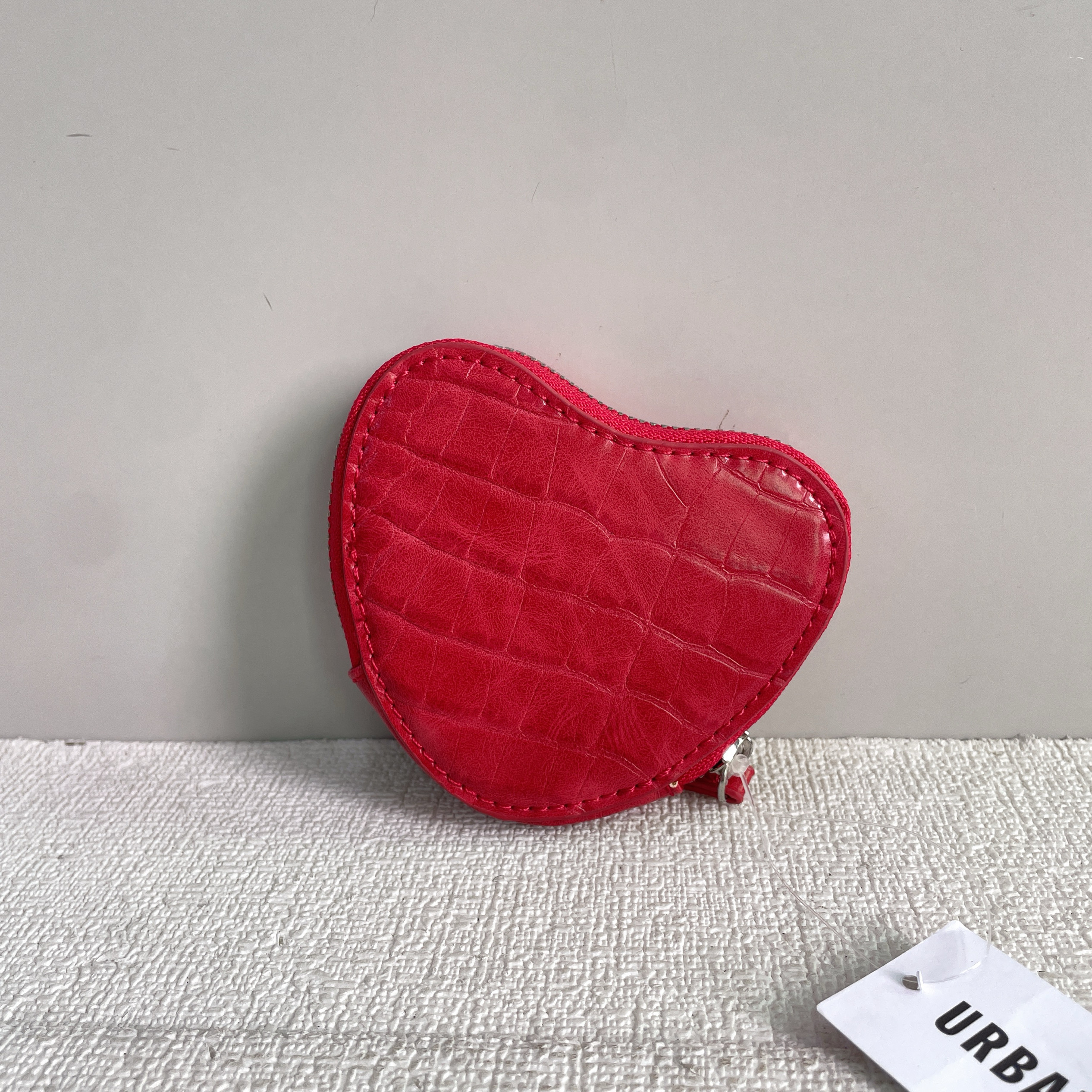 外贸尾货出英国UO心型零钱包硬币包