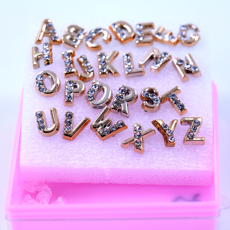 µØÌ¯¾«Æ·µêѧÉúÊÎÆ· º«°æËÜÁÏ·À¹ýÃôµã×ê26×ÖĸºÐ×°¶ú¶¤