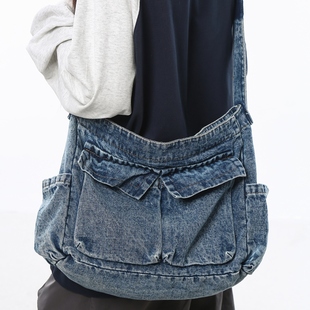 斜挎包水洗牛仔布单肩包男大容量休闲旅行百搭通勤上课装书背包女
