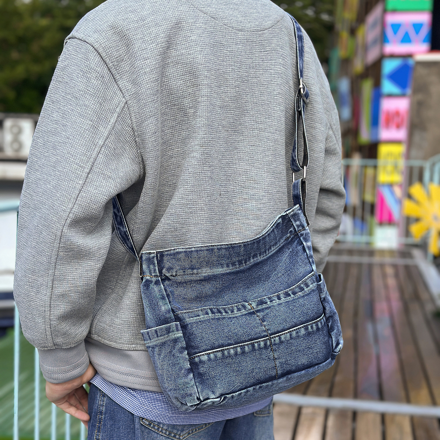 复古水洗牛仔布包斜挎包男生潮牌小众通勤单肩包旅行爬山小背包女