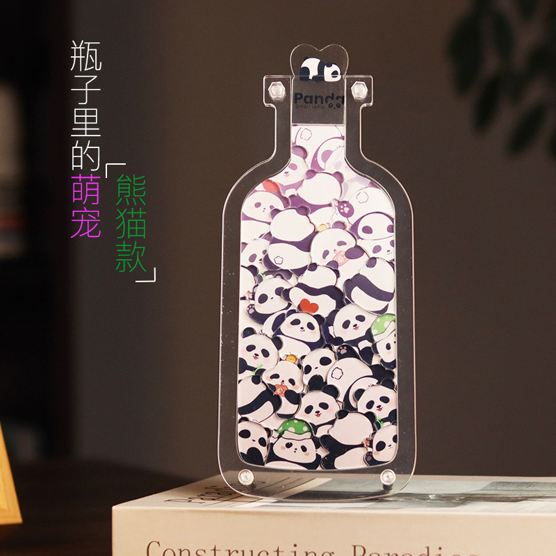 拼图瓶子里的萌宠益智玩具熊猫图片