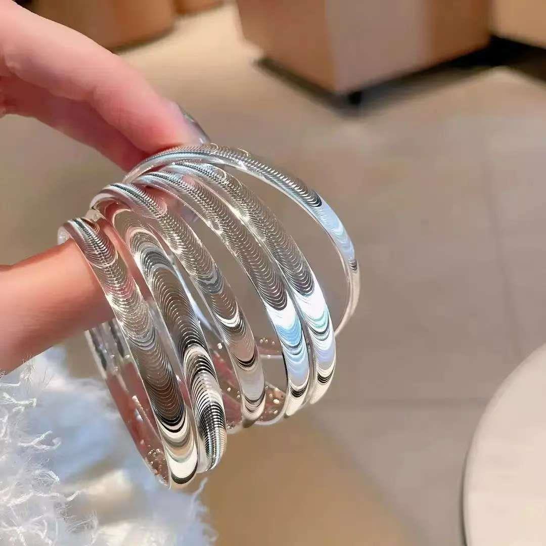 今泽饰品城银色猫眼手镯女高级感轻奢小众爆闪实心镯子送女友礼物