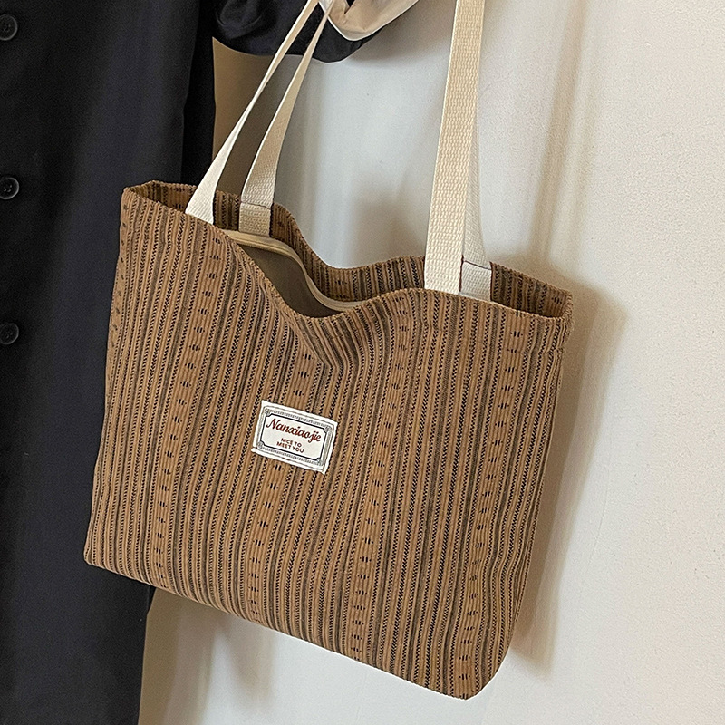 大容量灯芯绒包包2025新款通勤托特包女ins大学生上课单肩手提包