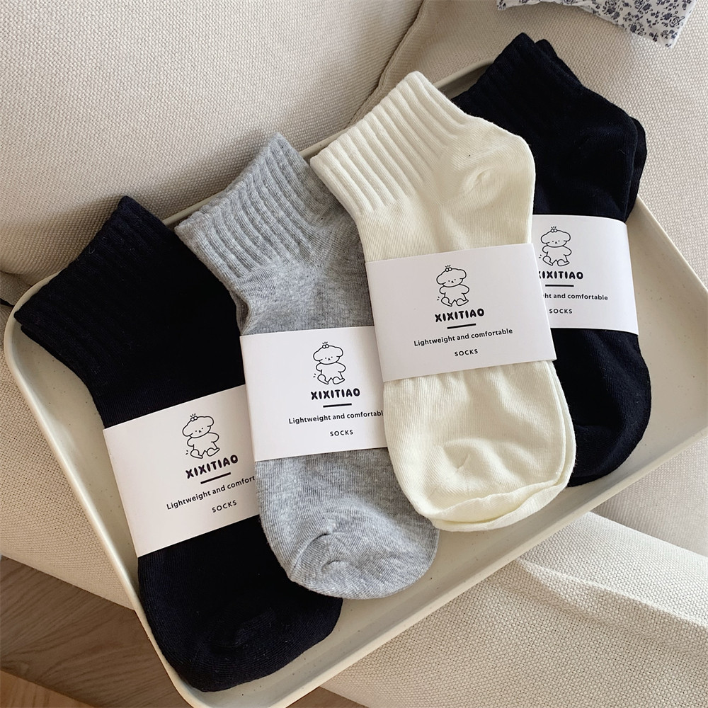 运动时尚简约针织黑白色透气棉袜子男女士春秋夏季舒适百搭中筒袜