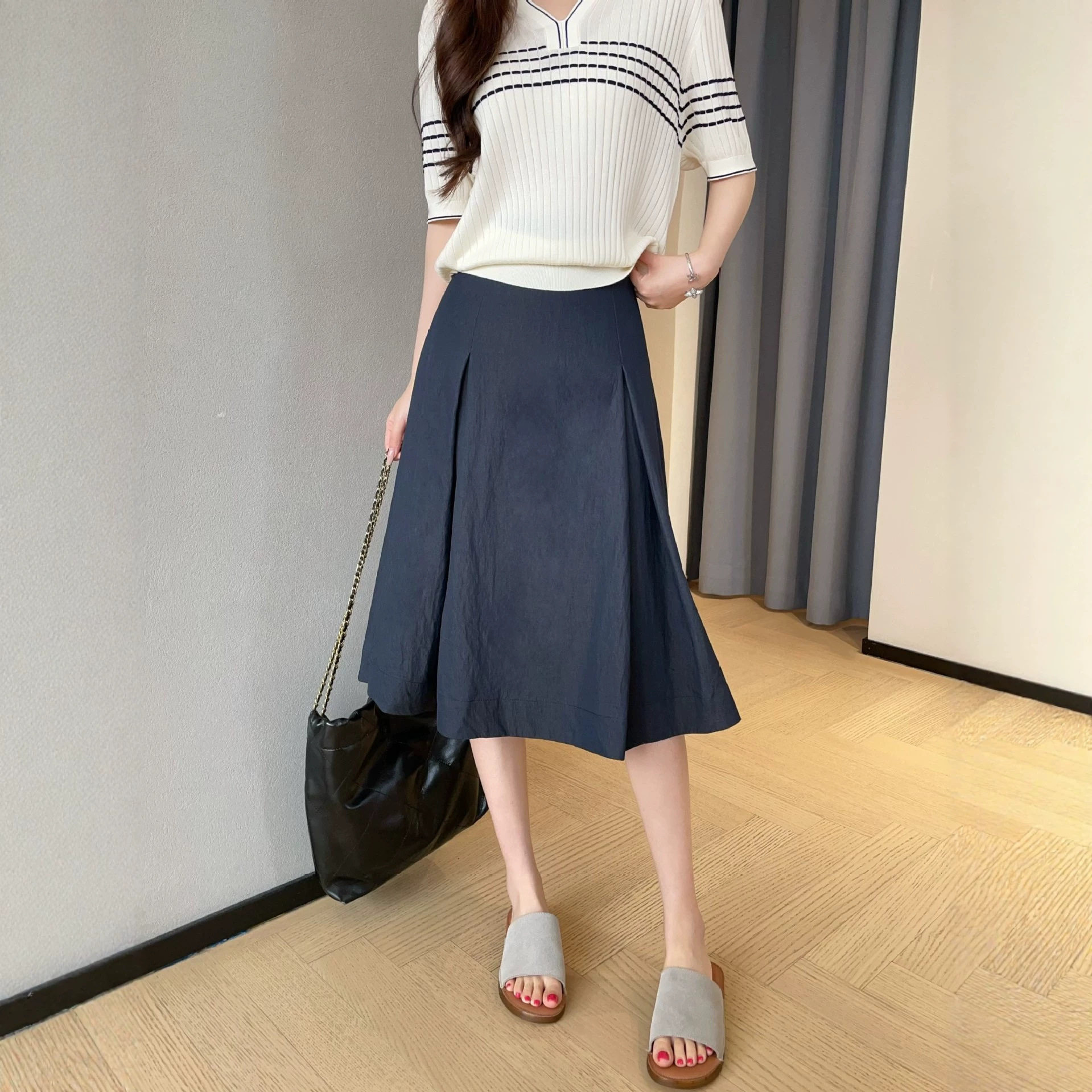 gao级感立体对褶牛仔色半身裙中长款高腰A字伞裙女2026新款