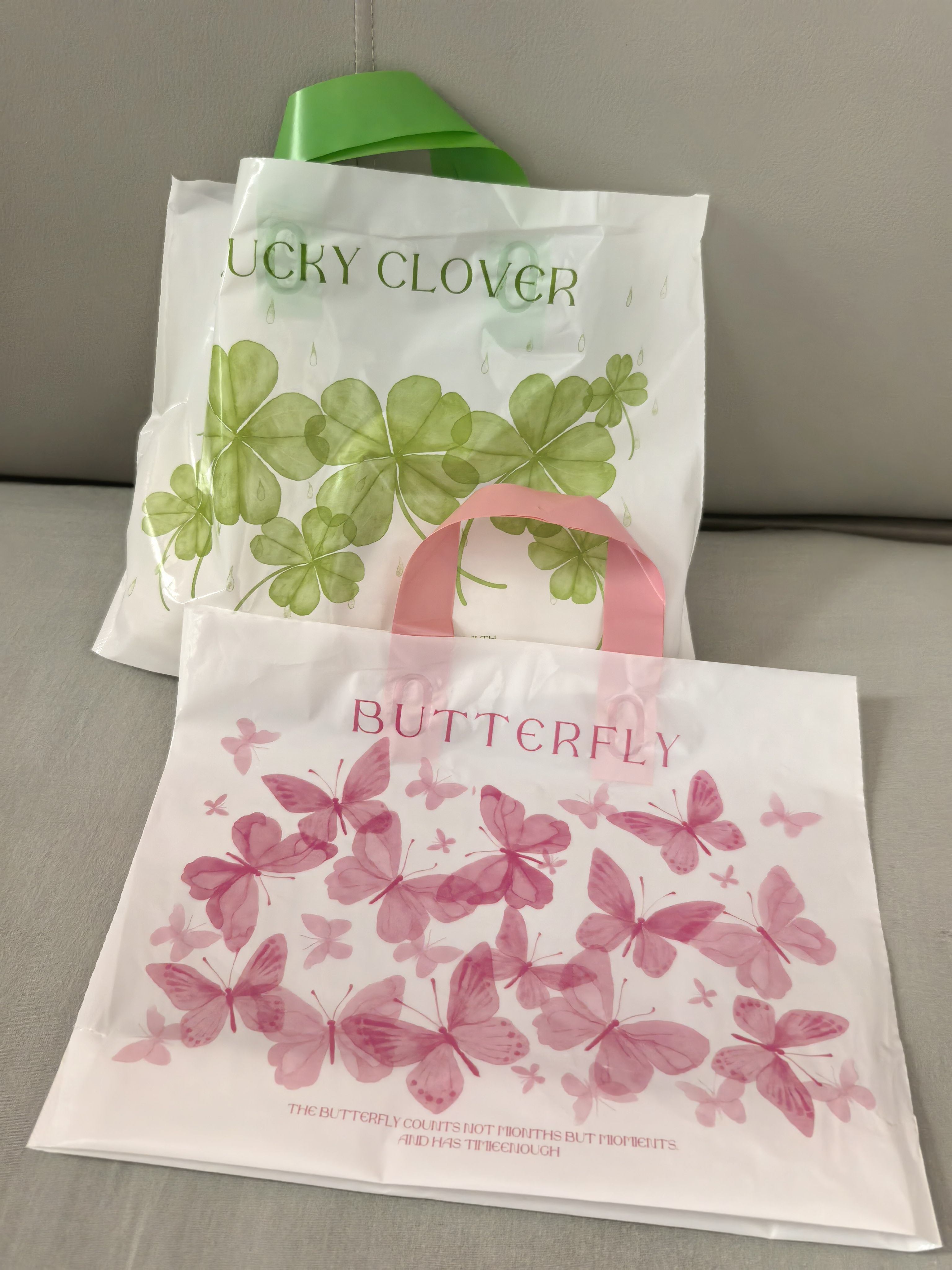 新款服装店手提袋塑料购物礼品包装袋装衣服好看的袋子童装袋定做
