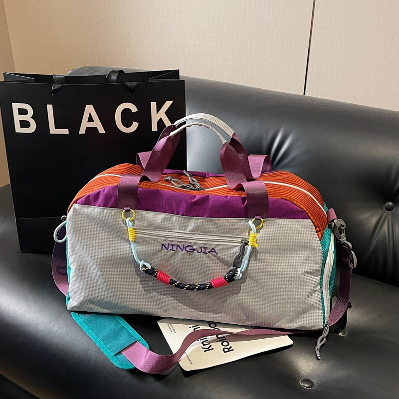 撞色拼接大容量旅行袋女手提斜挎健身包运动包欧美时尚单肩行李包