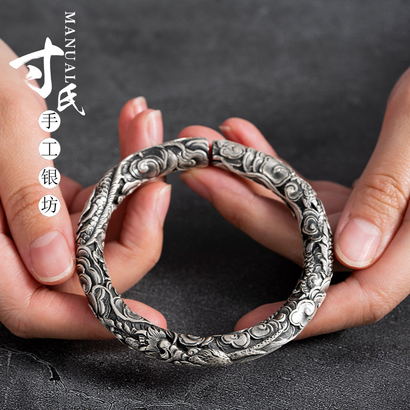 寸银坊云南手工制作足银立体浮雕满工圆柱四龙闹海手镯.传承