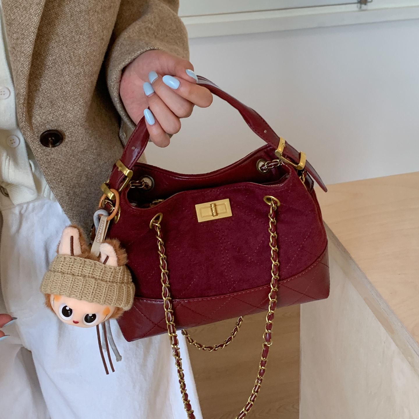 小香风链条手提水桶包包女式2025新款轻奢小众高级感斜挎红色婚包