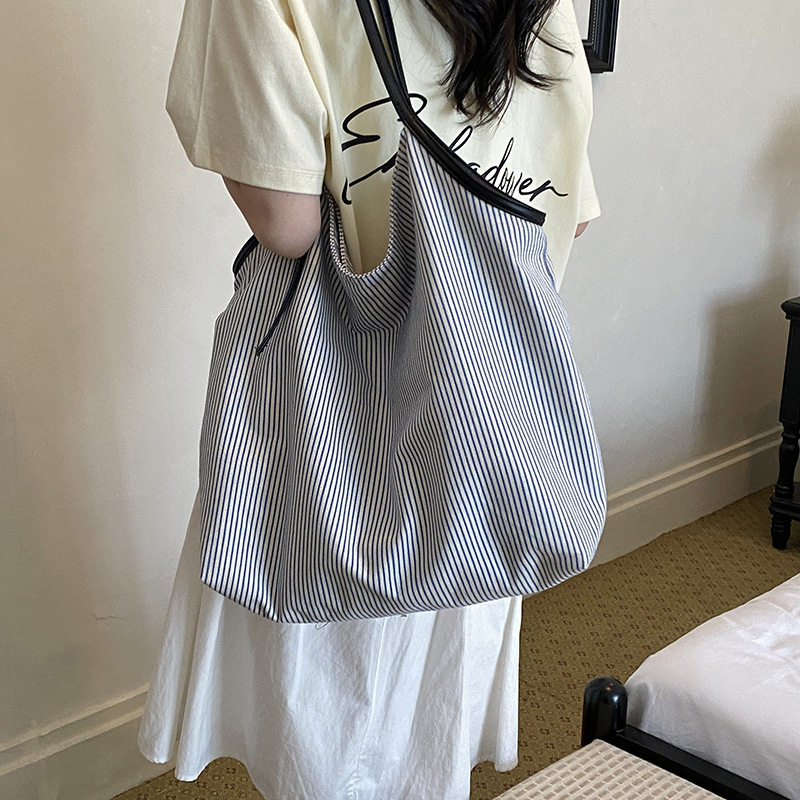 斜挎包女大容量条纹文艺女包新款托特包简约大学生上课单肩包