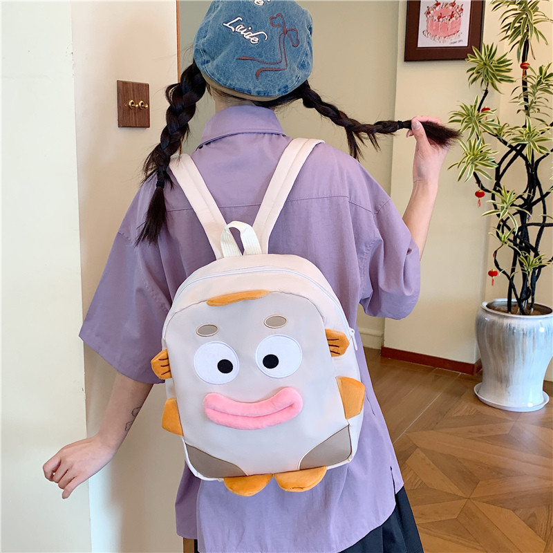 韩版可爱卡通双肩包女学生书包大容量丑萌日常背包女生休闲外出包图片