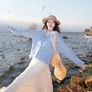 韩系慵懒风镂空针织开衫 甜美可爱纽扣显气质宽松显瘦毛衣外套