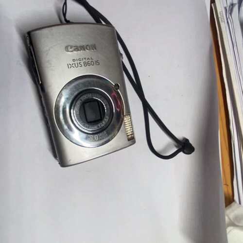议价来一台佳能ixus860，成色一般，外壳塑料部件有缺失（维修）