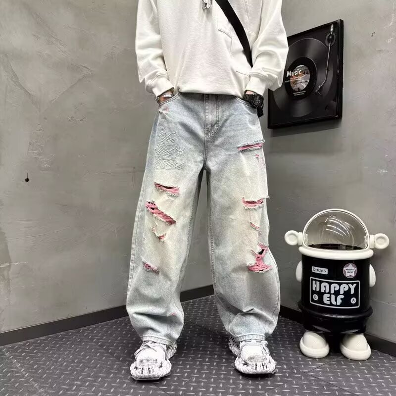 破洞弯刀裤宽松阔腿牛仔裤