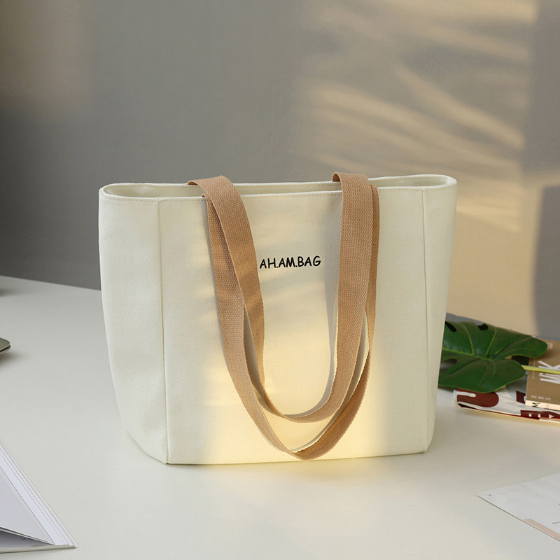 新款大容量单肩包女文艺休闲购物袋通勤托特包简约百搭手提帆布包