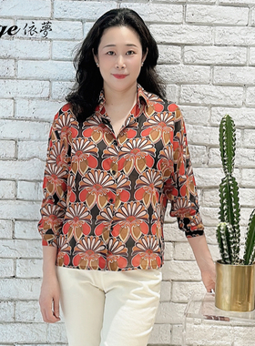 依梦新款橙色印花翻领设计落肩长袖衬衣05232361