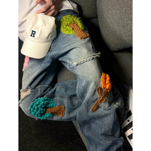 设计感立体钩花贴花绣宽松破洞休闲男女情侣长裤 获衣局牛仔裤 个性