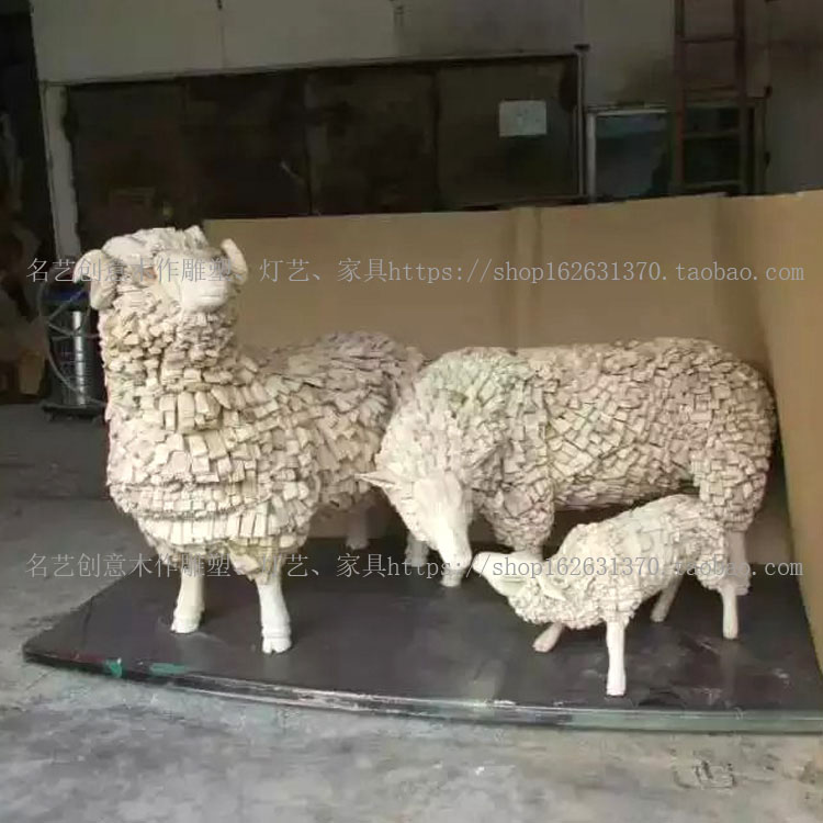 个性特色创意枯木漂浮羊雕塑