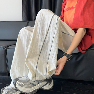 肌理感冰丝裤男夏季薄款宽松束脚阔腿裤子潮牌速干男士反光休闲裤