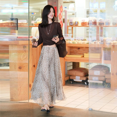 斜裁碎花不规则休闲半身长裙