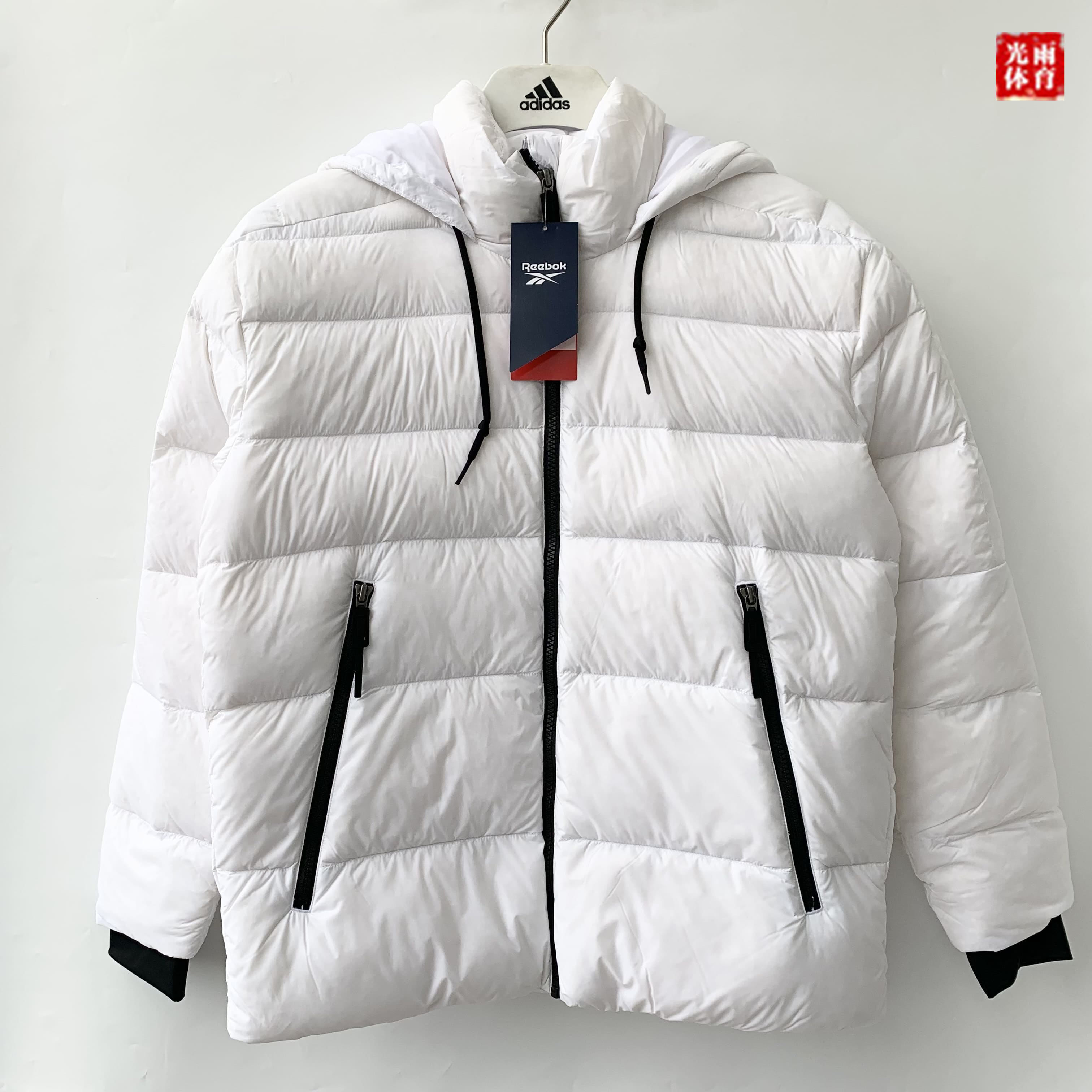 锐步女子时尚连帽保暖运动羽绒服