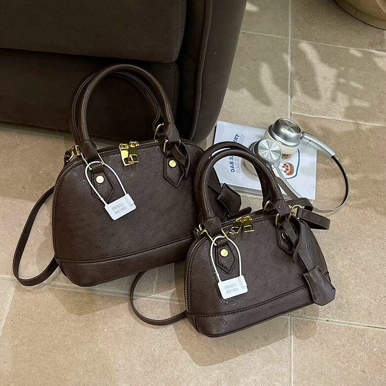 复古鸵鸟纹贝壳手提斜挎女包