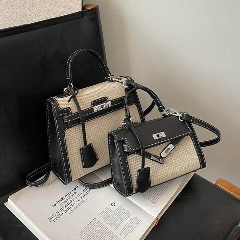 左杏高级质感凯莉包女2026新款时尚大容量帆布拼接手提单肩斜挎包