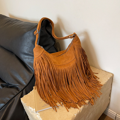 左杏流苏包大容量马鞍包