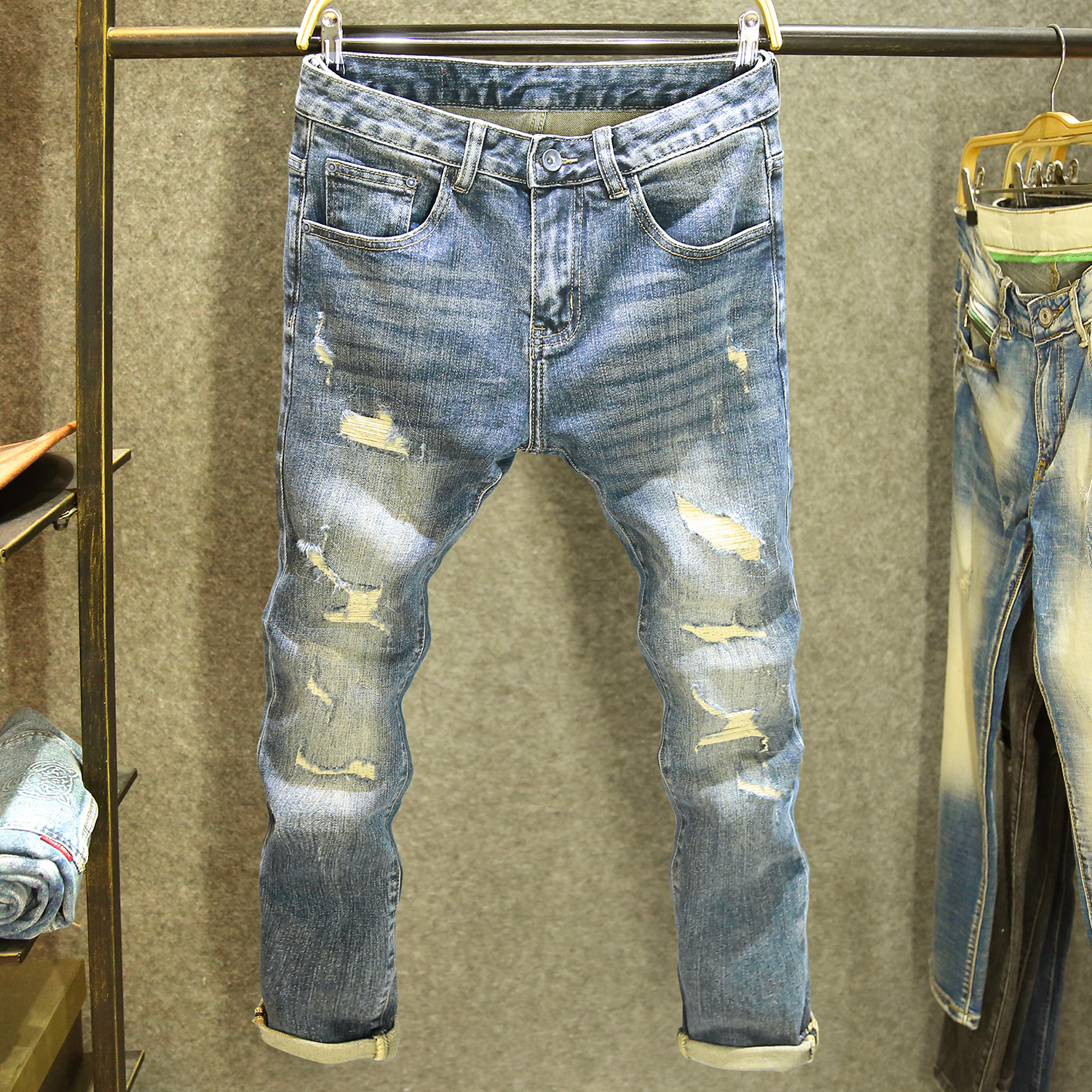 破洞补丁时尚痞帅裤子男牛仔裤