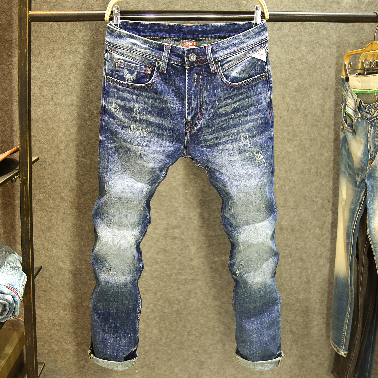 水洗耐磨潮牌猫须工艺牛仔裤男