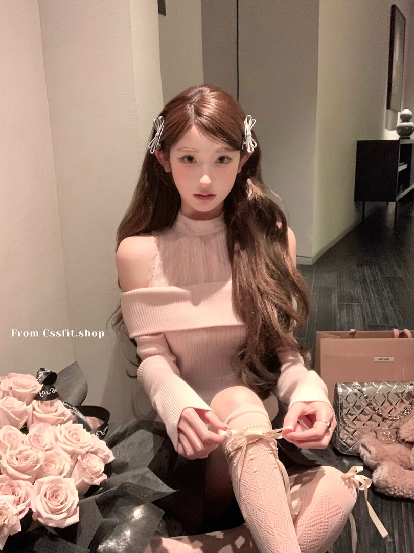 Pink off-shoulder knit dress worn by a model