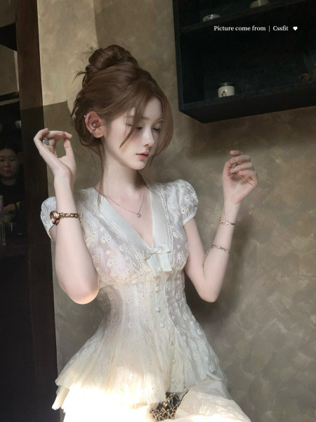Woman wearing a white lace dress
