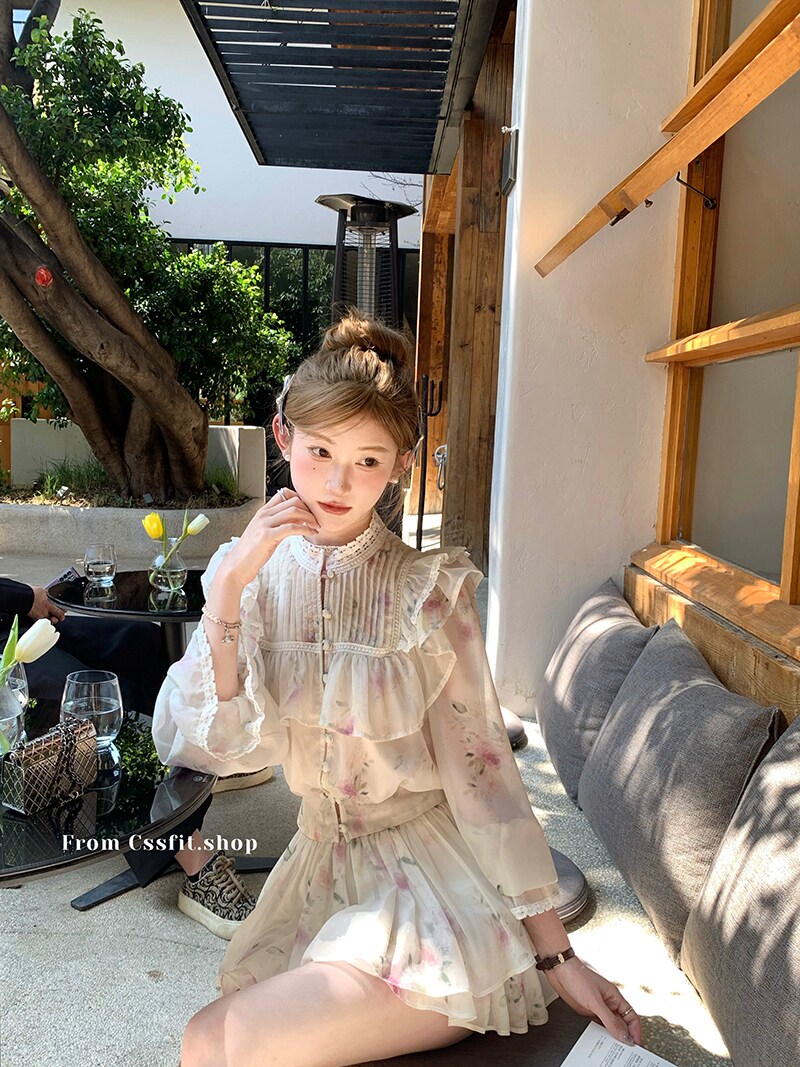 Woman wearing a light floral ruffled dress outdoors