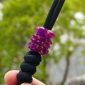 DIY紫色树脂金箔伞绳刀坠