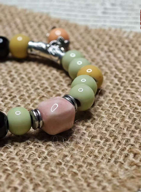 景德镇浅绿主调撞粉黄陶瓷手链