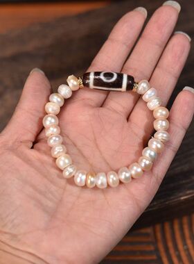 淡水珍珠带生长纹螺旋纹8.5mm搭配两眼天珠女士单圈手串