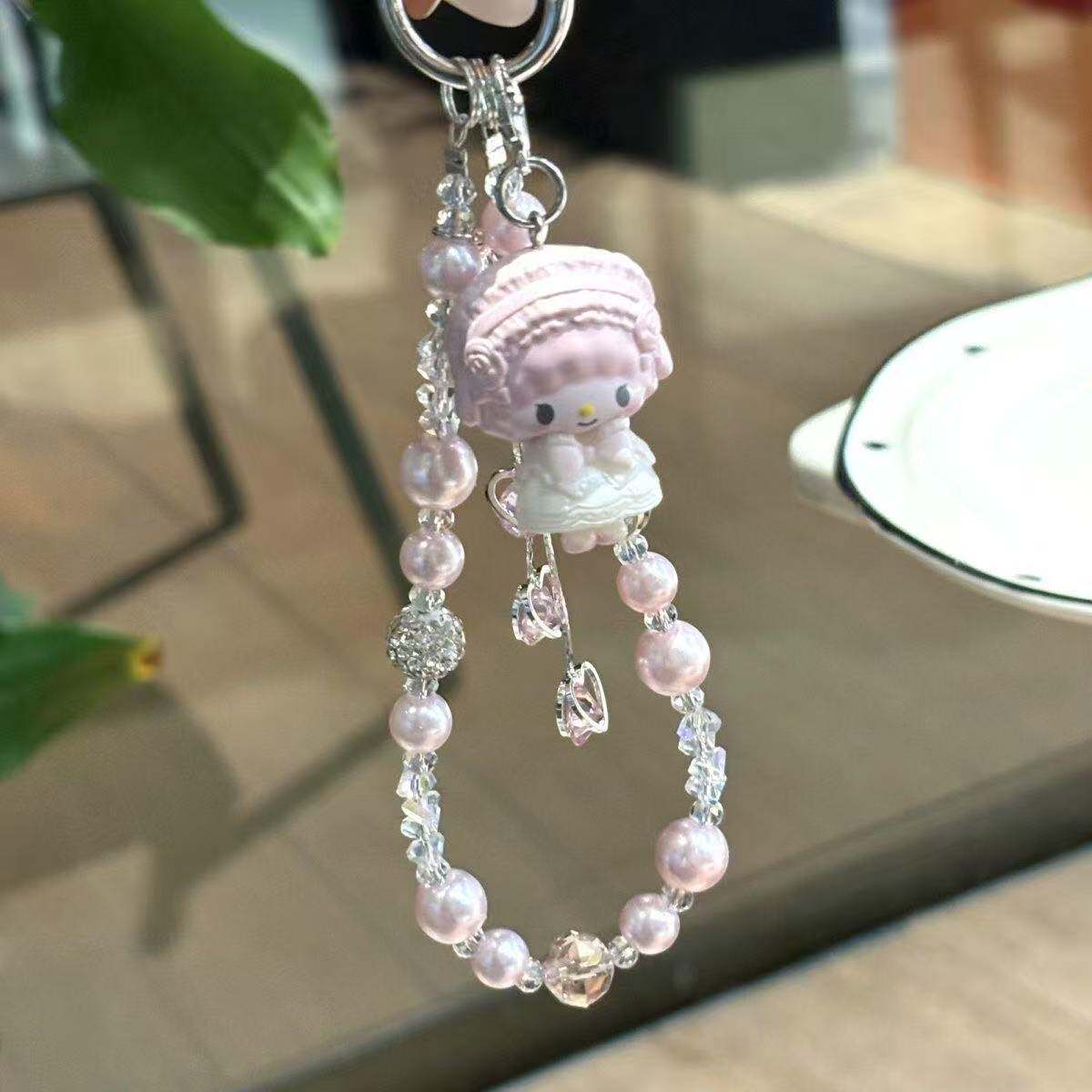 流苏水晶爱心小羊美乐蒂壳挂件ccd相机咕本卡册包包挂饰串珠