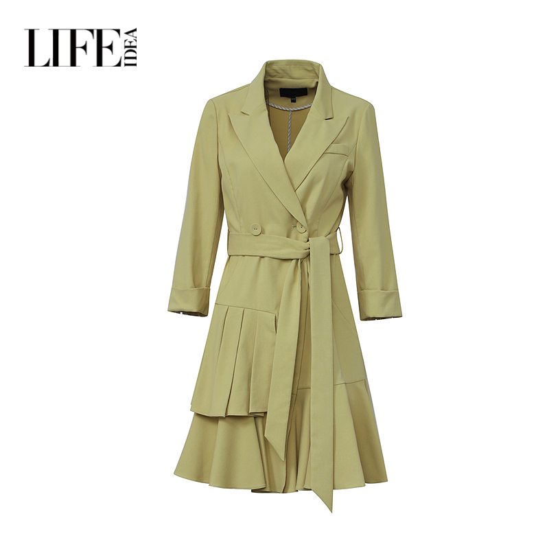 莱芙艾迪儿女装设计感新款时尚黄绿色摩登不规则裙摆中长袖连衣裙